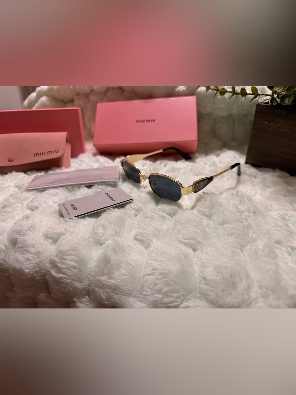 Miu Miu Gold Frame Sunglasses with Dark Gray Lenses